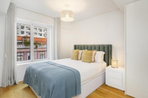 WHome Urban Oasis: Modern Living with Parking & AC